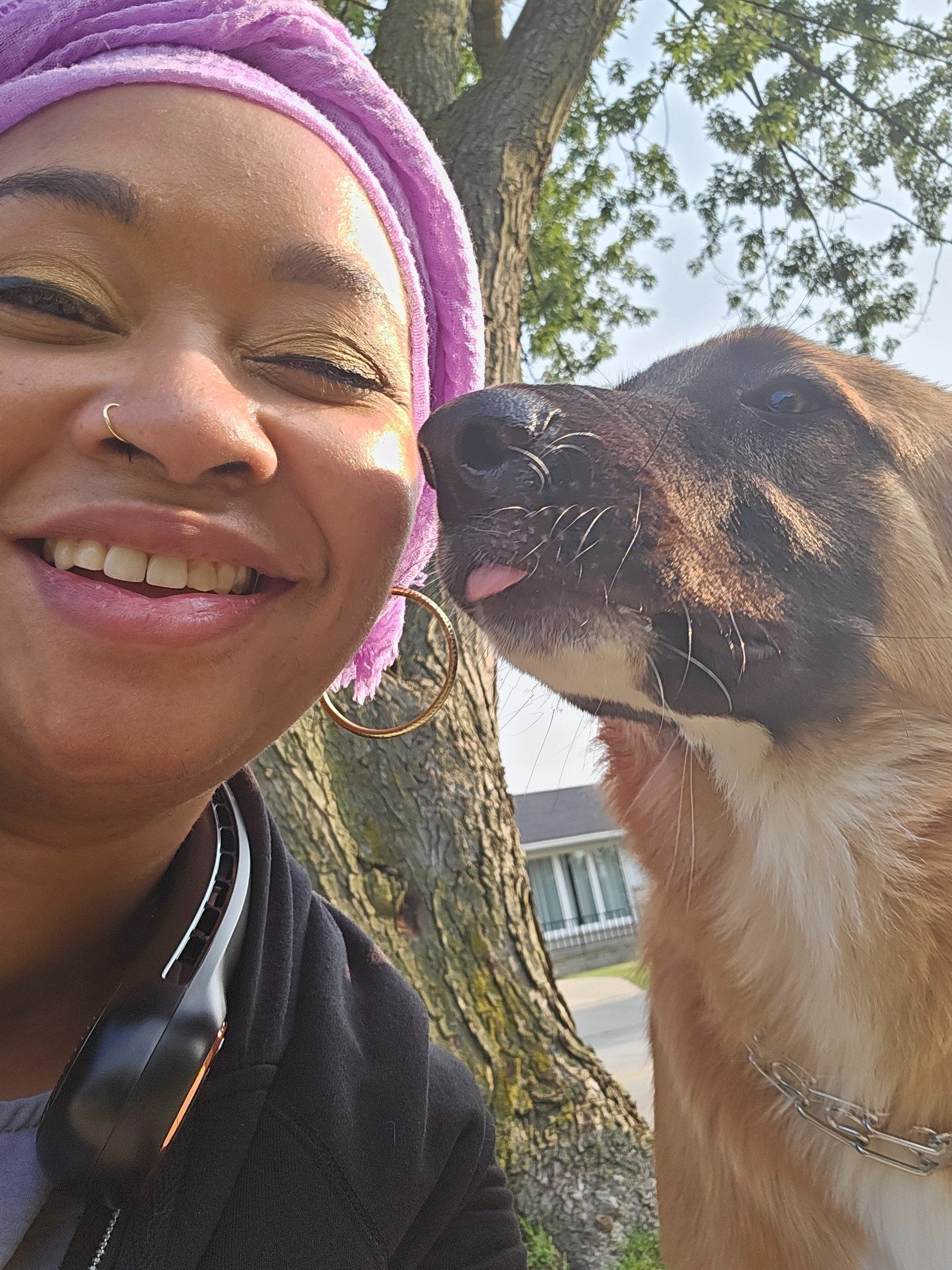 T. Toubeaux outdoors with her dog